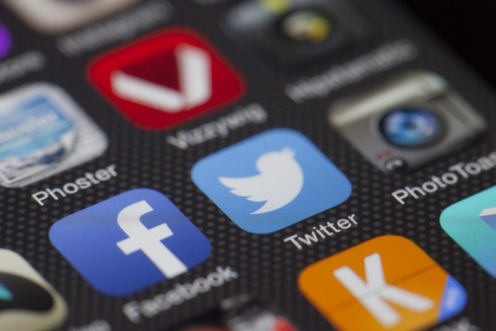 Icons of apps on a cellphone that help Social Media for Campgrounds